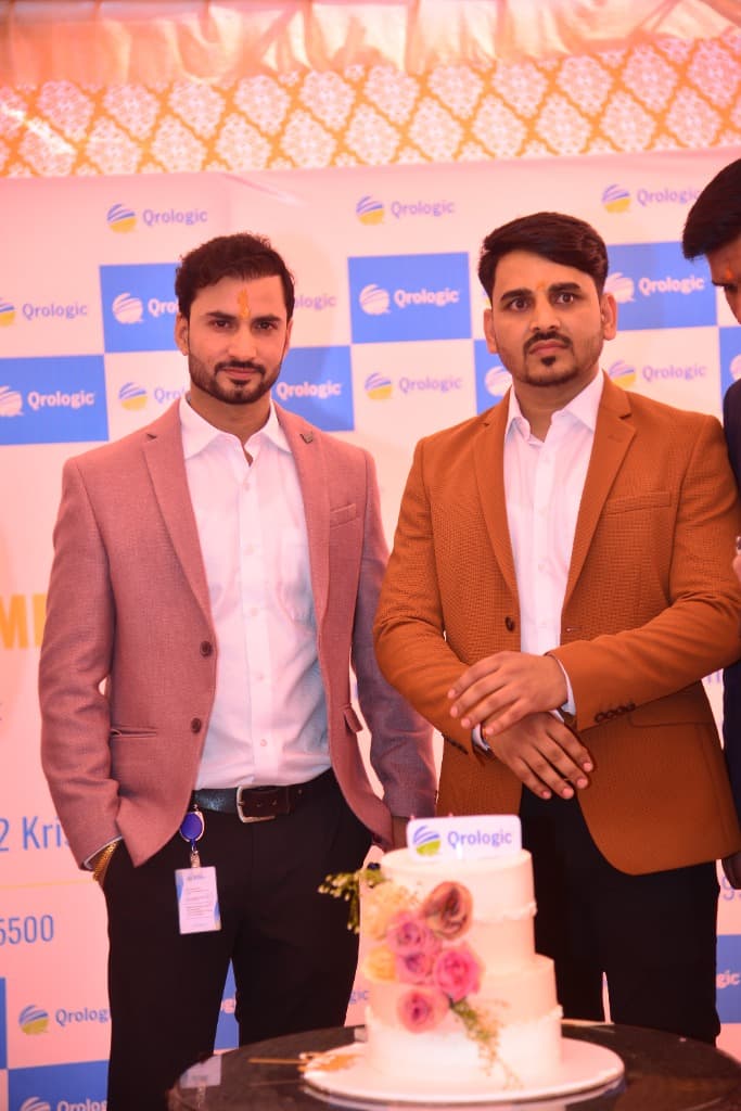 Ranjeet Saini at the Qrologic office opening — cake and celebration